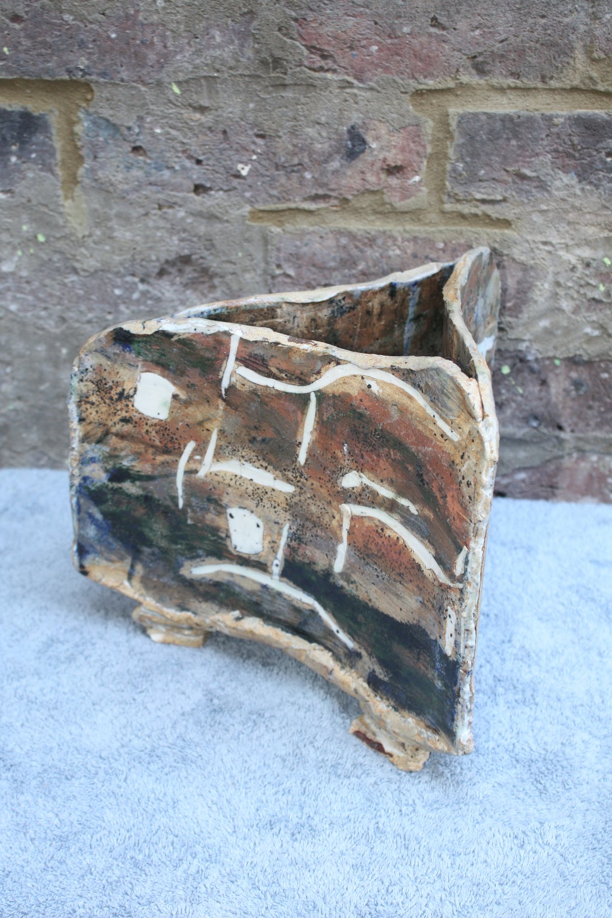 Triangular Strata Pot with inlaid porcelain and oxides by Graham Matthews