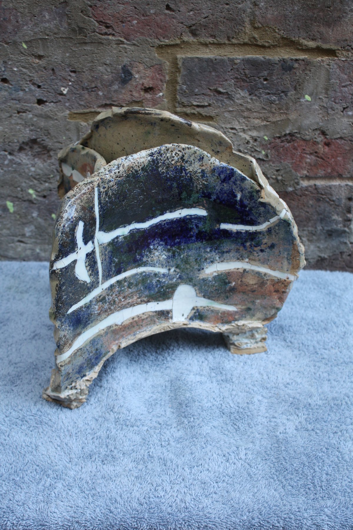 Triangular Strata Pot with inlaid porcelain and oxides by Graham Matthews