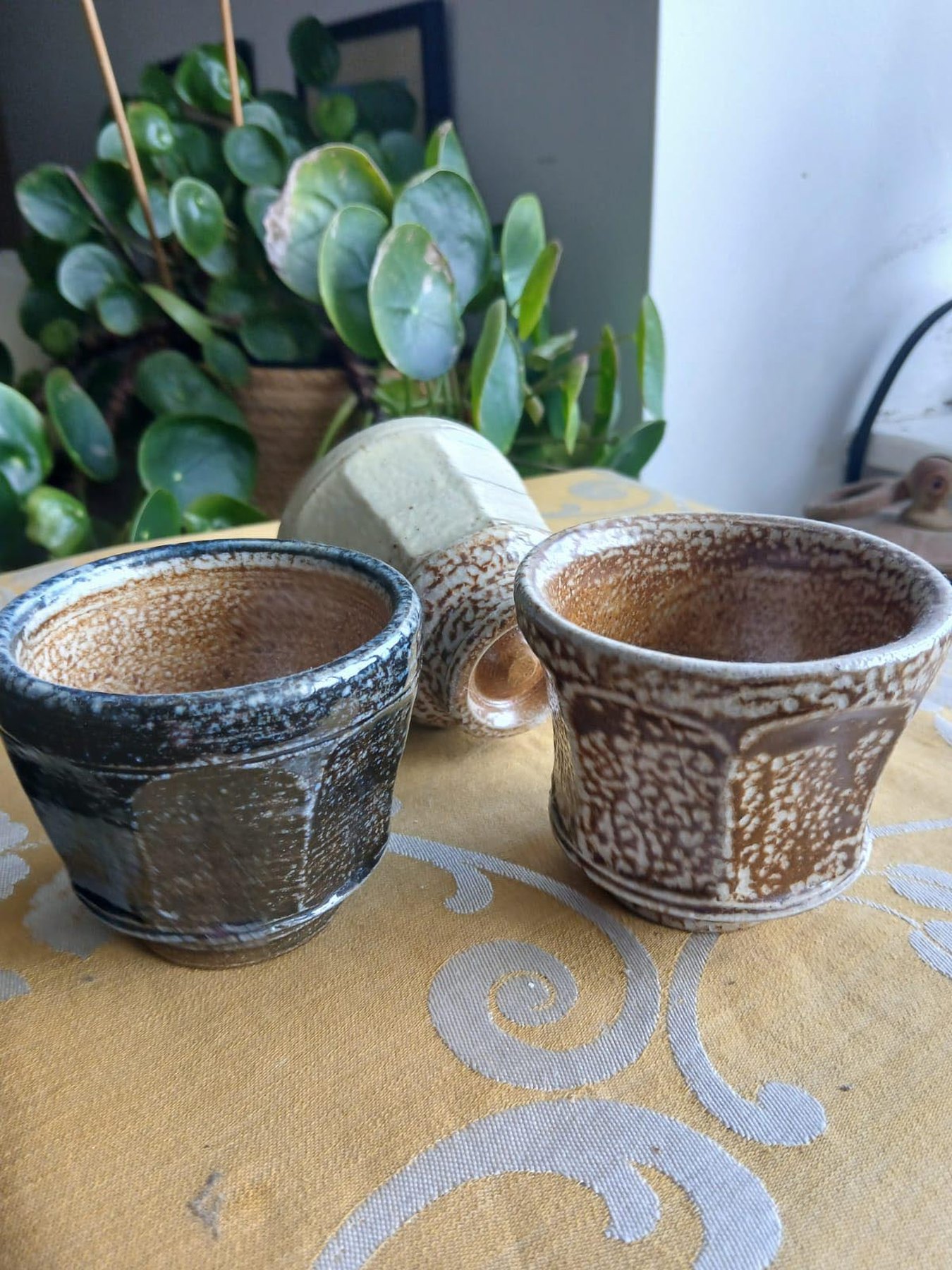 Faceted salt glaze yunomis by Graham Matthews